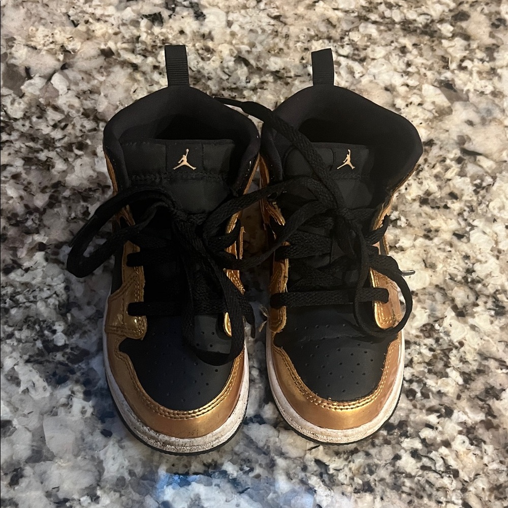Toddler Black & Gold Jordans. Size 10
